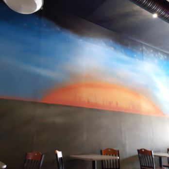 Sizzle - They're a wonderful and done paintings all over the walls done by the owner and creator of the restaurant. - Pizza Near Me - Philadelphia, Pennsylvania Sizzle - They're a wonderful and done paintings all over the walls done by the owner and creator of the restaurant. - Pizza Near Me - Philadelphia, Pennsylvania