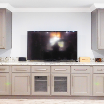 Strong Tower Renovations - a flat screen tv in a kitchen - General Contractors Near Me