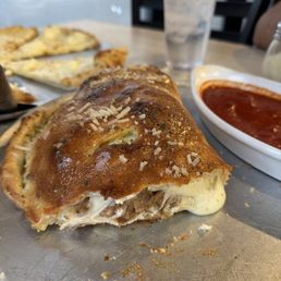 Calzone with meatball and sausage. Calzone with meatball and sausage.