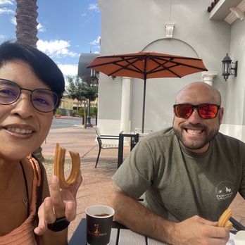 Ole Churros - Eating a churro - Spanish Near Me - Paradise, Nevada Ole Churros - Eating a churro - Spanish Near Me - Paradise, Nevada