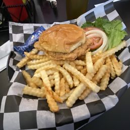 a chicken sandwich and french fries a chicken sandwich and french fries