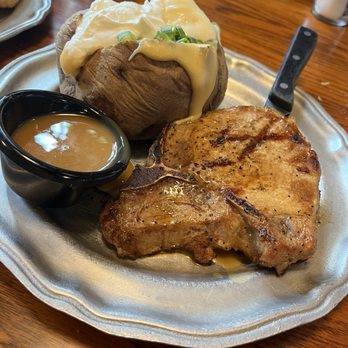 Patti's 1880's Settlement - One inch pork chop with loaded baked potato - American Near Me - Grand Rivers, Kentucky