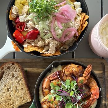 Sugar and Scribe  - Shrimp and grits with toast and Blazin' Chilaquiles Skillet - Bakeries Near Me - La Jolla, California