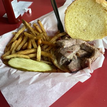 Tom's BBQ - Sliced brisket sandwich with a side of hand cut fries - Barbeque Near Me - Mesa, Arizona