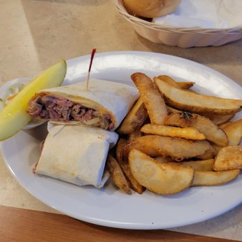 Metro 7 Diner - Balboa Wrap - roast beef, swiss, russian dressing with side of fries, pickle and cole slaw. - Diners Near Me - Latham, New York Metro 7 Diner - Balboa Wrap - roast beef, swiss, russian dressing with side of fries, pickle and cole slaw. - Diners Near Me - Latham, New York