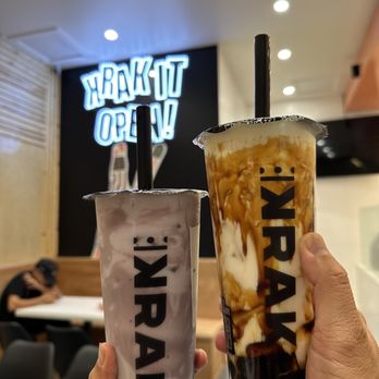 Krak Boba - a hand holding a cup of coffee - Bubble Tea Near Me - Lake Forest, California Krak Boba - a hand holding a cup of coffee - Bubble Tea Near Me - Lake Forest, California