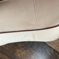 Dearborn Shoe Repair - Painted the whole shoe and missed several spots. Never asked him to do the whole shoe, just fix the scratch.