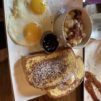 First Watch - French Toast with a side of Sunny Side Eggs and Million Dollar Potatoes - Breakfast & Brunch Near Me - Boynton Beach, Florida First Watch - French Toast with a side of Sunny Side Eggs and Million Dollar Potatoes - Breakfast & Brunch Near Me - Boynton Beach, Florida
