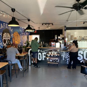 Cafeina Cafe - Seating area and ordering station - Cafes Near Me - San Diego, California Cafeina Cafe - Seating area and ordering station - Cafes Near Me - San Diego, California