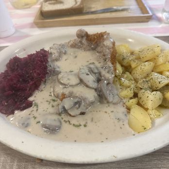 Mama G’s - Jaeger Schnitzel with Red Cabbage and German Potato Salad - Bakeries Near Me - Sarasota, Florida Mama G’s - Jaeger Schnitzel with Red Cabbage and German Potato Salad - Bakeries Near Me - Sarasota, Florida