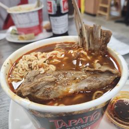 a bowl of ramen with meat and noodles a bowl of ramen with meat and noodles