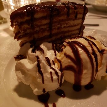 Aspen Grille - 10 layer cake with vanilla ice cream - New American Near Me - Myrtle Beach, South Carolina Aspen Grille - 10 layer cake with vanilla ice cream - New American Near Me - Myrtle Beach, South Carolina