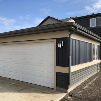Premier Built Garages - Lovely detail on this garage exterior. Small upgrade, big return. - Garage Door Services Near Me - Edmonton, Alberta