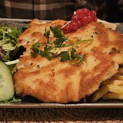 Eierwiese - The Cordon Bleu dish w/salad and fries. Plus a delightful container of cranberry relish