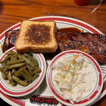Rib City - mouth watering full baby back ribs with 2 sides, and a piece of delicious garlic toast! - Barbeque Near Me - Naples, Florida