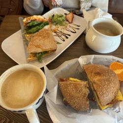 1. Egg, bacon, cheese on sesame bagel 2. Launchpad sandwich 3. Oatmilk latte