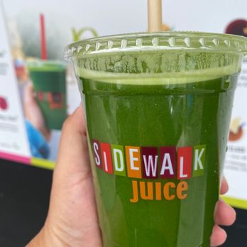 Sidewalk Juice - a hand holding a cup of juice - Juice Bars & Smoothies Near Me - San Francisco, California Sidewalk Juice - a hand holding a cup of juice - Juice Bars & Smoothies Near Me - San Francisco, California