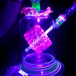 Mile High Pipe & Tobacco III - Illuminati glass from Liquid Sci Glass.