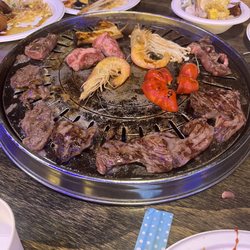 Shinara Grill & Lounge - Beef, shrimp and red peppers on the grill