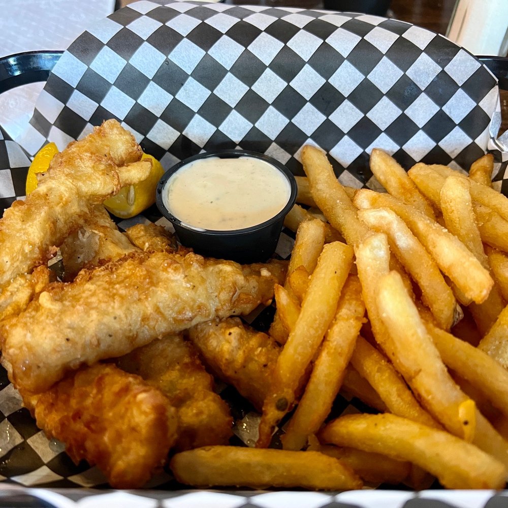 Billy's Grille & Bar - Fish and chips. Fish was not crispy but limp and mushy. Fries were excellent - American Near Me - Bryan, Texas