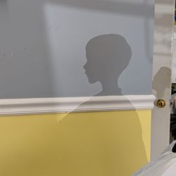 Kim's Barber Shop - My son's shadow making a clear silhouette during his haircut.