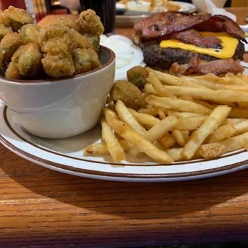Delmonicos - a burger and fries on a plate - Buffets Near Me - Jackson, Missouri