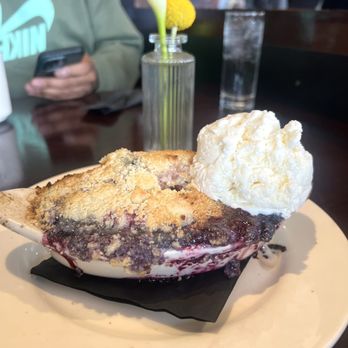 Beverly Hills Grill - Peach, blueberry cobbler excellent. Probably the best cobbler I ever had yummy - American Near Me - Beverly Hills, Michigan