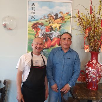 Pho Nam Cali - Thai & Chef in front of the Chinese New Year display. - Vietnamese Near Me - National City, California