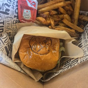 Potato Pit & Juice Bar - Fish burger - Poutineries Near Me - Dearborn, Michigan Potato Pit & Juice Bar - Fish burger - Poutineries Near Me - Dearborn, Michigan