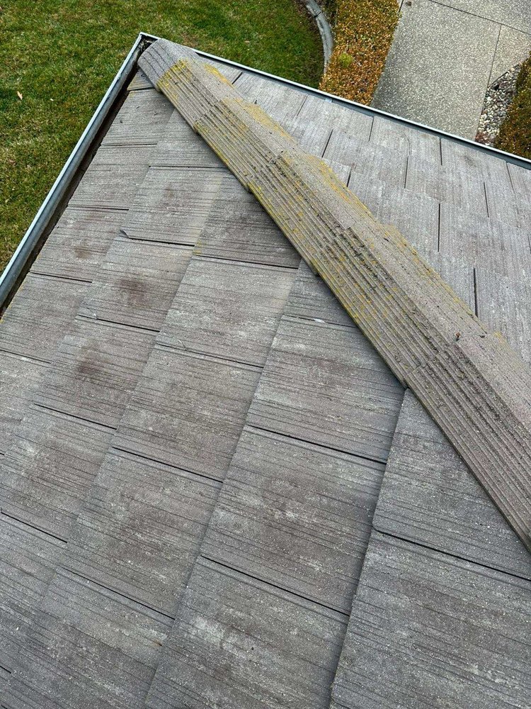 Slide of Tommy´s Roofing