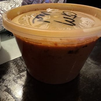 The India Cafe - Small deli container of main chicken dish - Indian Near Me - Costa Mesa, California