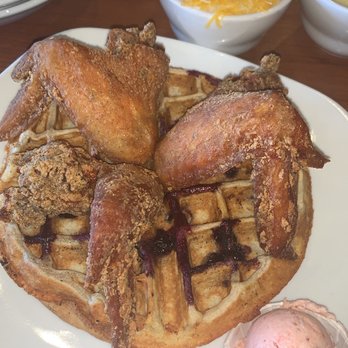 Dame's Chicken and Waffles - The Carolina Cockerel. Blueberry Waffle, strawberry shmear & cheese grits - New American Near Me - Cary, North Carolina Dame's Chicken and Waffles - The Carolina Cockerel. Blueberry Waffle, strawberry shmear & cheese grits - New American Near Me - Cary, North Carolina
