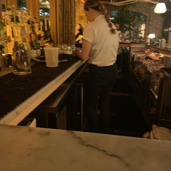 Pastis Miami - Bartender on her phone all night - French Near Me - Miami, Florida Pastis Miami - Bartender on her phone all night - French Near Me - Miami, Florida