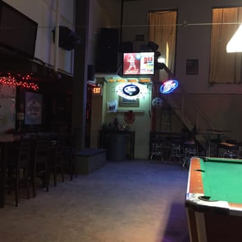 Atrium Lounge - a pool table in the foreground - Lounges Near Me - Midland, Texas Atrium Lounge - a pool table in the foreground - Lounges Near Me - Midland, Texas