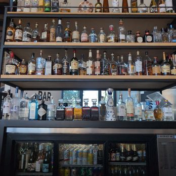 DRINK BAR - a variety of alcohol bottles on shelves - Cocktail Bars Near Me - Tustin, California DRINK BAR - a variety of alcohol bottles on shelves - Cocktail Bars Near Me - Tustin, California