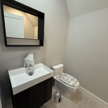 Porcelanosa - Bathroom vanity with coordinating mirror - Kitchen & Bath Near Me - North Bethesda, Maryland Porcelanosa - Bathroom vanity with coordinating mirror - Kitchen & Bath Near Me - North Bethesda, Maryland