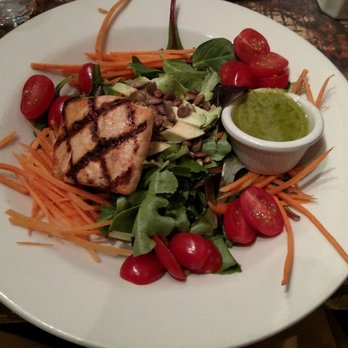 Betty's - Nice fresh salad and the salmon was the perfect size all for$14. - New American Near Me - Buffalo, New York