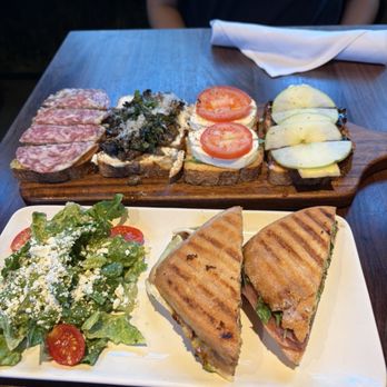 Postino Village District - Prosciutto Brie Panini Bruschetta Board - Wine Bars Near Me - Raleigh, North Carolina Postino Village District - Prosciutto Brie Panini Bruschetta Board - Wine Bars Near Me - Raleigh, North Carolina