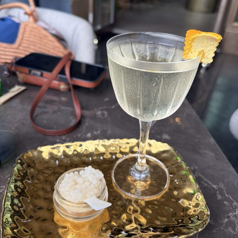 One40 Rooftop - Velour - Rum, St. Germane, orange bitters (and a side of lychee caviar) - $25 - Breakfast & Brunch Near Me - New York, New York