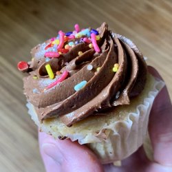Brown Butter Creations - Vanilla cupcake with chocolate frosting and sprinkles.