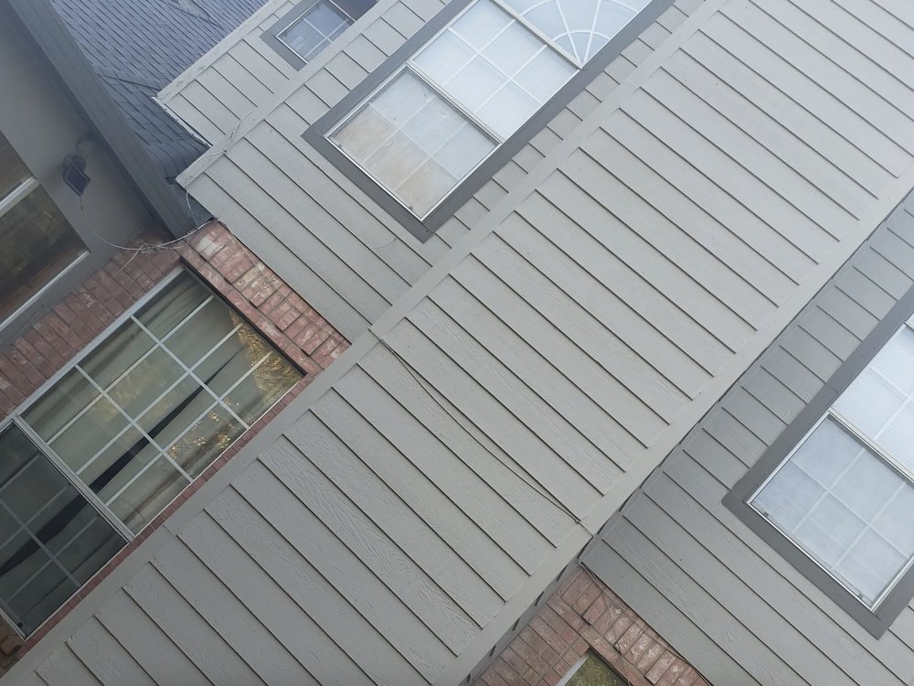 Slide of Harry's Roofing and Construction