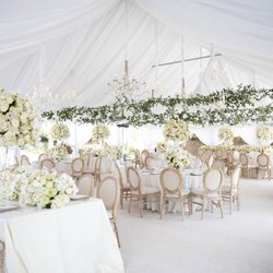 Custom draped tent, King Louis Chair, Chandeliers, and custom flooring. No end to what we can do.