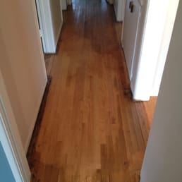 Hall before Fullerton Flooring.  The hall was left in this condition after having a One Day No Sanding Treatment by OC Dustfree.