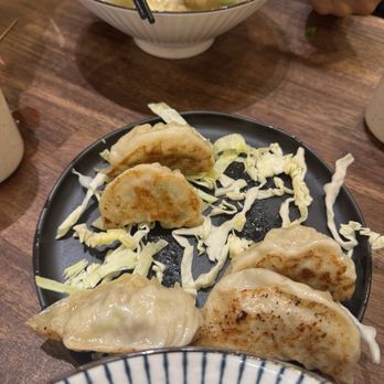 Nom Nom Bistro - Hand-Made Potstickers - Dim Sum Near Me - Millbrae, California Nom Nom Bistro - Hand-Made Potstickers - Dim Sum Near Me - Millbrae, California