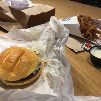 Smashburger - Greasy mushroom Swiss burger and over salted onion strings - Burgers Near Me - Westwood, Massachusetts Smashburger - Greasy mushroom Swiss burger and over salted onion strings - Burgers Near Me - Westwood, Massachusetts