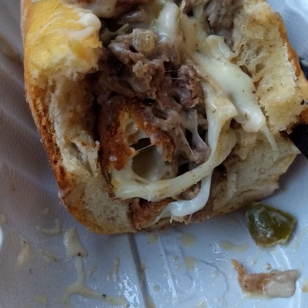 The Truffleist - Hungry Man has mozzarella sticks, peppers, and truffle fries in it - Street Vendors Near Me - New York, New York The Truffleist - Hungry Man has mozzarella sticks, peppers, and truffle fries in it - Street Vendors Near Me - New York, New York