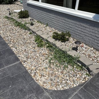 Modern Home Builders Landscape - No landscape fabric under the edging (front walk). It's like this everywhere. I weeded a couple weeks ago and this is after a new rain. - Landscape Architects or Designers Near Me - Graymoor-Devondale, Kentucky Modern Home Builders Landscape - No landscape fabric under the edging (front walk). It's like this everywhere. I weeded a couple weeks ago and this is after a new rain. - Landscape Architects or Designers Near Me - Graymoor-Devondale, Kentucky