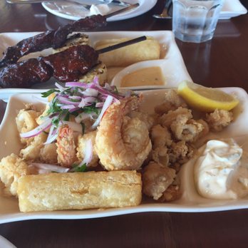 Puerto 27 Peruvian Kitchen & Pisco Bar - Mixed seafood (calamari) - Peruvian Near Me - Pacifica, California Puerto 27 Peruvian Kitchen & Pisco Bar - Mixed seafood (calamari) - Peruvian Near Me - Pacifica, California