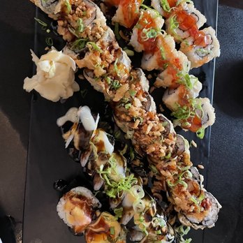 Poké Sushi - Black Mamba Chef Specialty Roll - bottom  Large Marge Tempura Roll - middle  Crab Rangoon Roll - top - Sushi Bars Near Me - Rochester, New York
