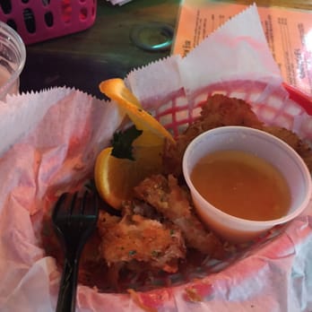 Squid Lips - Onion Chips with coconut batter. It was a greasy nightmare... - Seafood Near Me - Melbourne, Florida